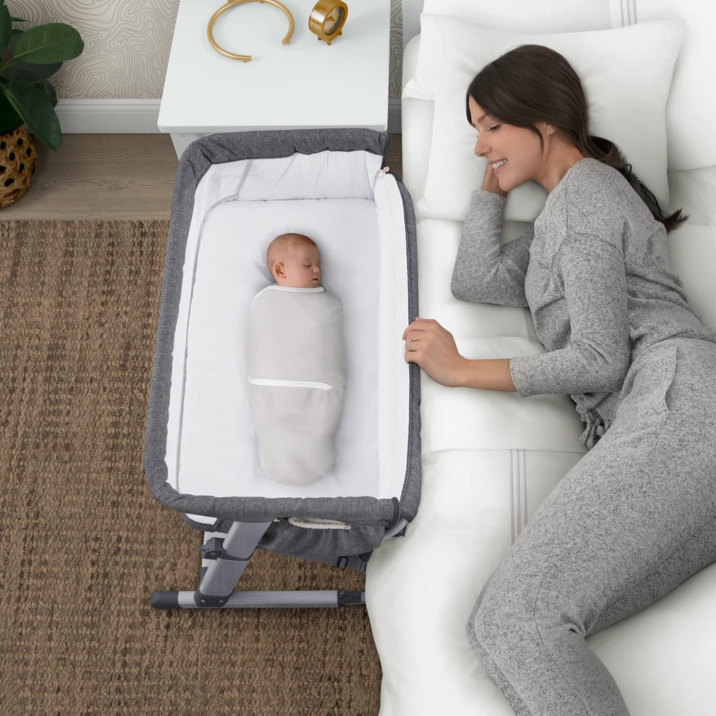 Simmons Kids Dream Bedside Bassinet with Zip-Down Side Wall, Breathable Mesh, Adjustable Heights, Lightweight Portable Crib, Grey C438517